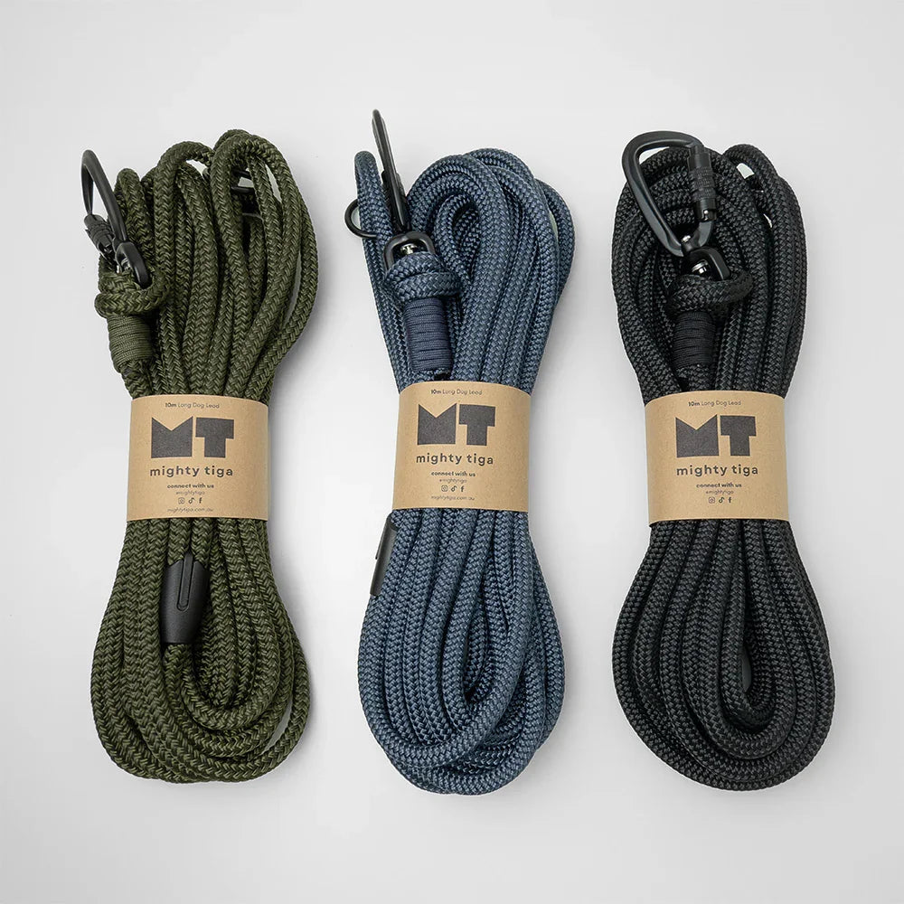 Three bundles of long dog leads in army green, navy blue, and black with 'mighty tiga' labels on a white background.
