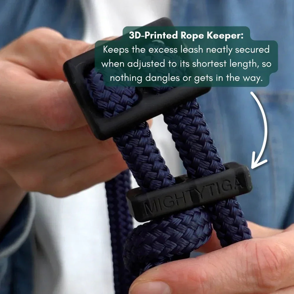 3D-Printed Rope Keeper on a navy leash with text explaining its function.