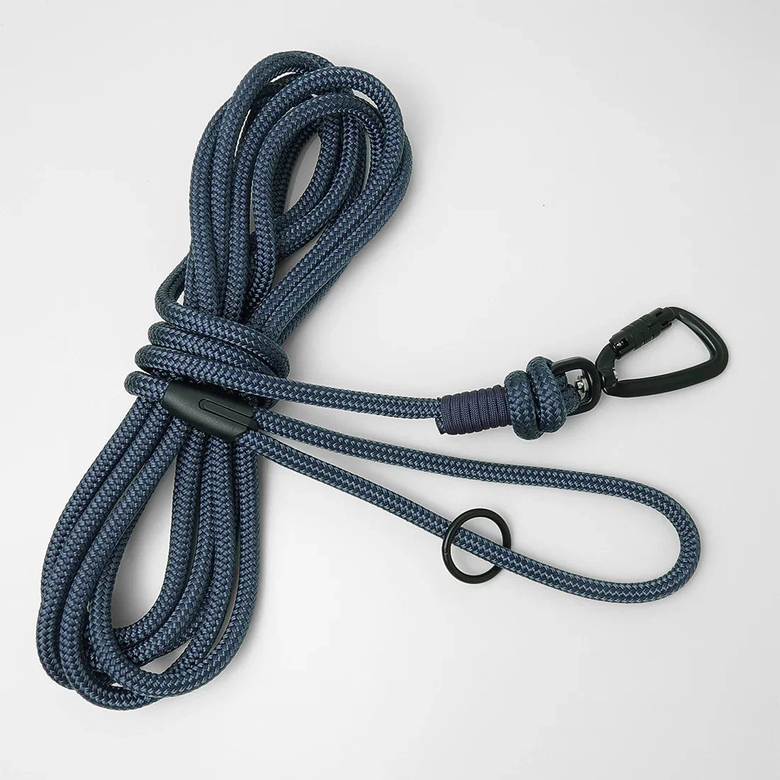 Blue long line lead with black carabiner on a white background