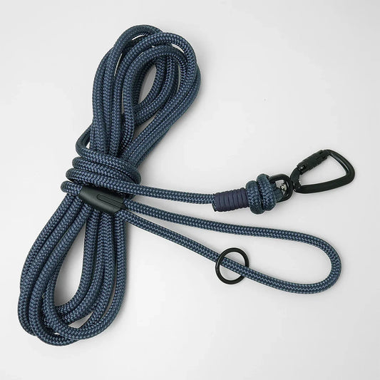 Blue long line lead with black carabiner on a white background