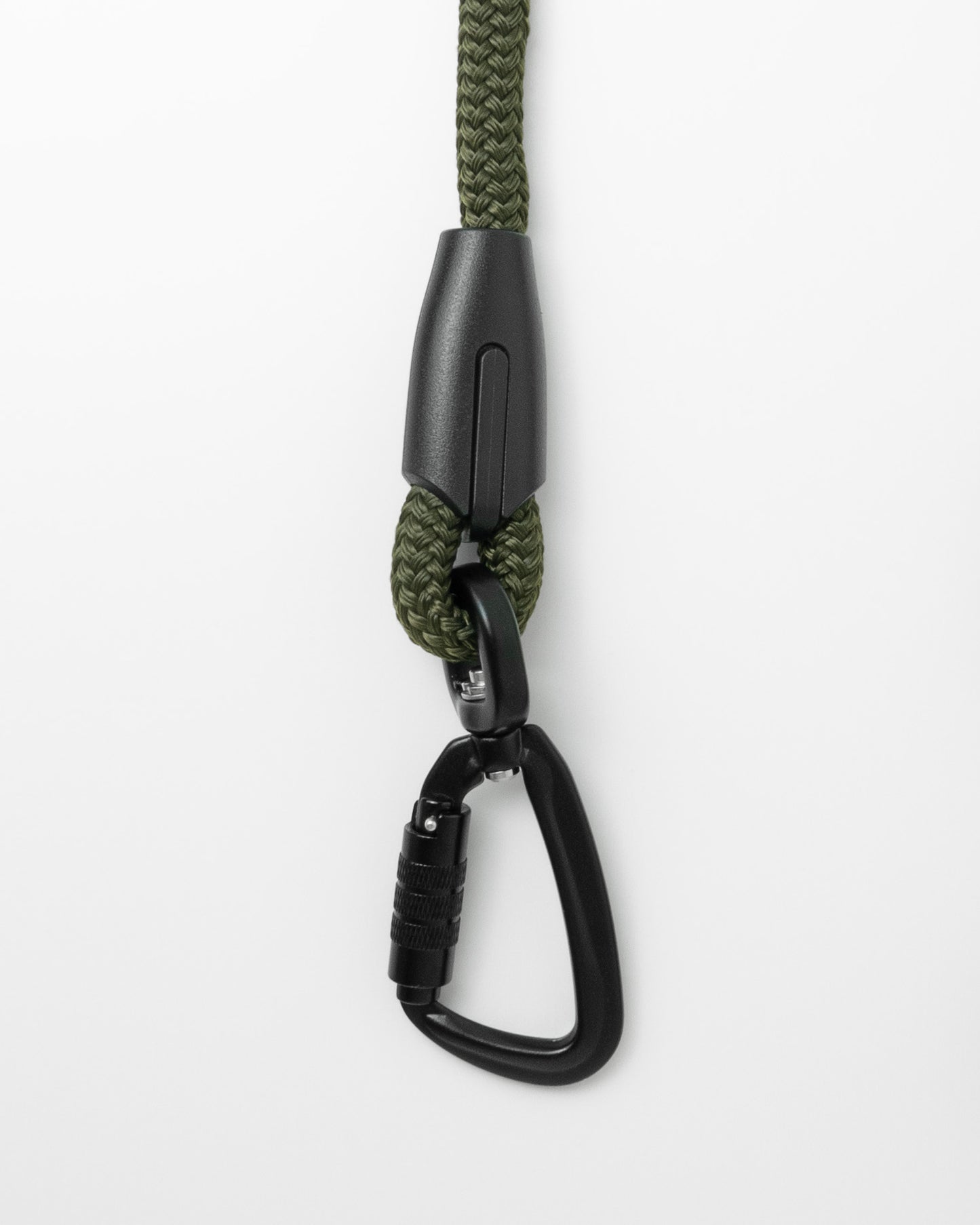 close up of swivel carabiner of army green handsfree leash