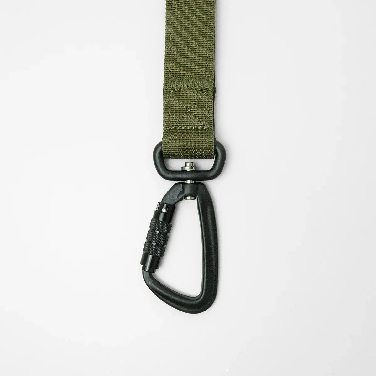 black swivel carabiner of army green dog lead
