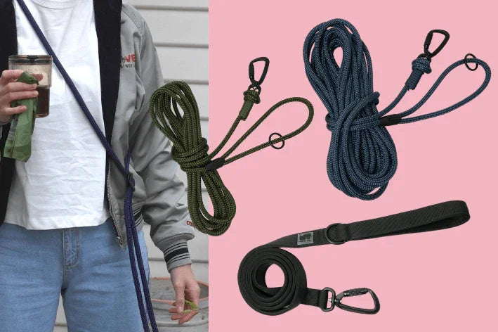 wearing hands-free dog leash, showing long line lead and handheld dog lead on pink background