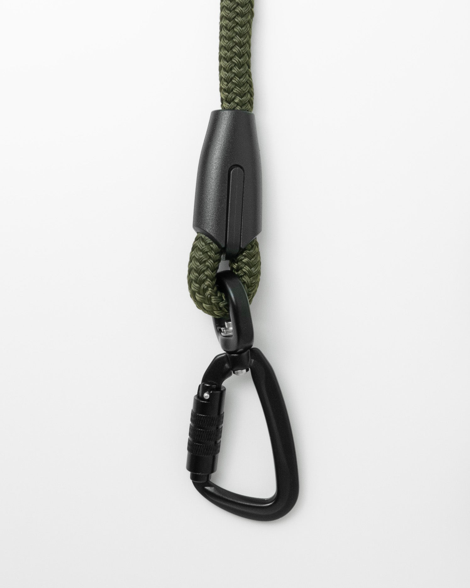 close up of swivel carabiner of army green handsfree leash