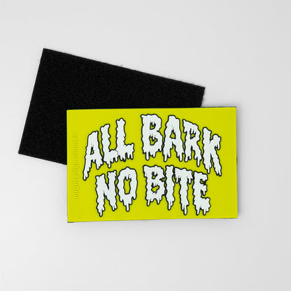 lime green PVC patch with the text all bark no bite