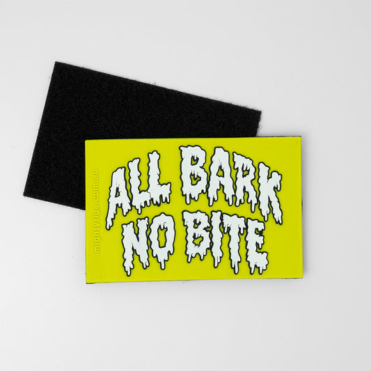 lime green PVC patch with the text all bark no bite