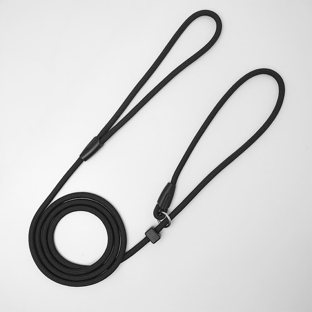 high quality paracord slip lead in colour black coiled up on white background