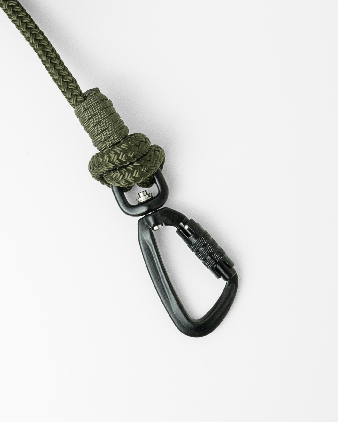 Detail view of long line dog training lead  black swivel carabiner, shown in army green on white background