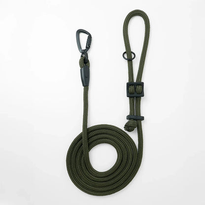Army green hands-free dog leash by Mighty Tiga, rolled for display on white background