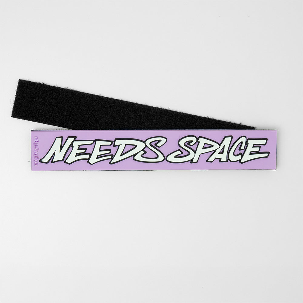 PVC dog harness patch with the text ''needs space'' on a white background
